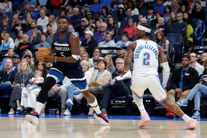 Mar 15, 2026; Oklahoma City, Oklahoma, USA; Minnesota Timberwolves guard Anthony Edwards (5) drives past Oklahoma City Thunder guard Shai Gilgeous-Alexander (2) during the second half at Paycom Center. Mandatory Credit: Alonzo Adams-Imagn Images