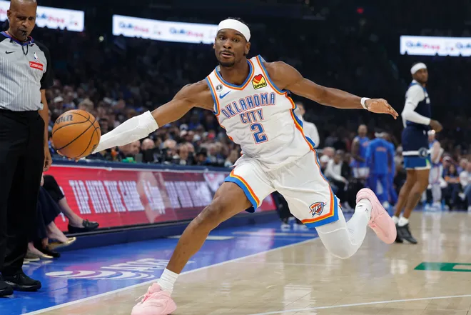 Mar 15, 2026; Oklahoma City, Oklahoma, USA; Oklahoma City Thunder guard Shai Gilgeous-Alexander (2) reaches to save the ball from going out of bounds on a play against the Minnesota Timberwolves during the first half at Paycom Center. Mandatory Credit: Alonzo Adams-Imagn Images
