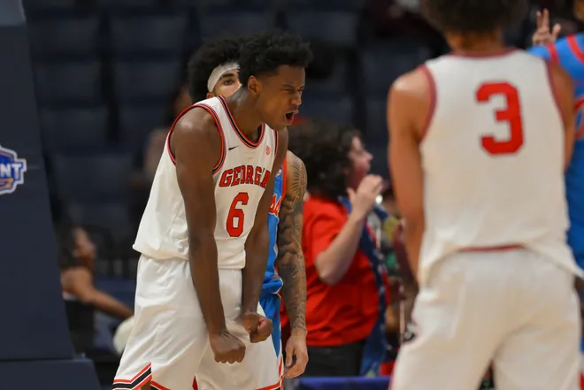 Georgia Bulldogs forward Kanon Catchings (6) reacts after a made three point basket against the Mississippi Rebels