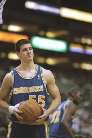 28 Mar 1997: Forward Andrew DeClercq of the Golden State Warriors holds the ball during a game against the Phoenix Suns at the America West Arena in Phoenix, Arizona. The Suns won the game 122-115 in overtime. Mandatory Credit: Elsa Hasch /Allsport