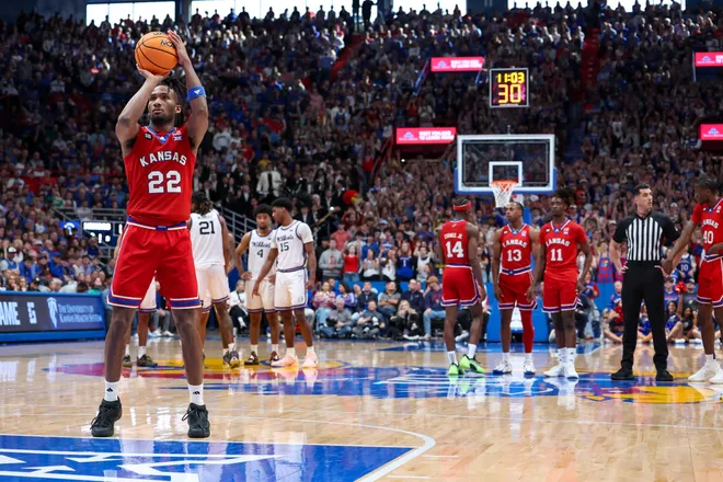 Mar 7, 2026; Lawrence, Kansas, USA; Kansas Jayhawks guard Darryn Peterson (22) shoots a free throw during the second half against the Kansas State Wildcats at Allen Fieldhouse. Mandatory Credit: Scott Sewell-Imagn Images