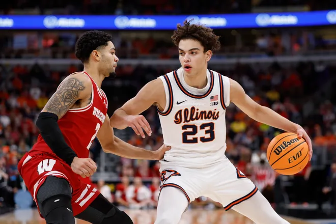 Mar 13, 2026; Chicago, IL, USA; Wisconsin Badgers guard Nick Boyd (2) defends against Illinois Fighting Illini guard Keaton Wagler (23) during the second half at United Center. Mandatory Credit: Kamil Krzaczynski-Imagn Images