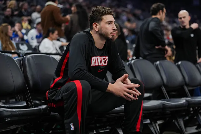 Jan 11, 2026; Sacramento, California, USA; Houston Rockets center Alperen Sengun (28) looks on from the bench before a game against the Sacramento Kings at Golden 1 Center. Mandatory Credit: Justine Willard-Imagn Images