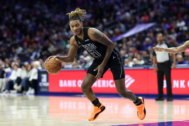 Mar 14, 2026; Philadelphia, Pennsylvania, USA; Brooklyn Nets forward Noah Clowney (21) dribbles the ball against the Philadelphia 76ers during the second quarter at Xfinity Mobile Arena. Mandatory Credit: Bill Streicher-Imagn Images
