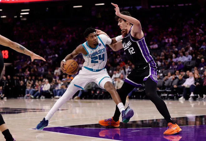Mar 11, 2026; Sacramento, California, USA; Charlotte Hornets forward/guard Brandon Miller (24) drives in against Sacramento Kings center Maxime Raynaud (42) during the third quarter at Golden 1 Center. Mandatory Credit: Kelley L Cox-Imagn Images