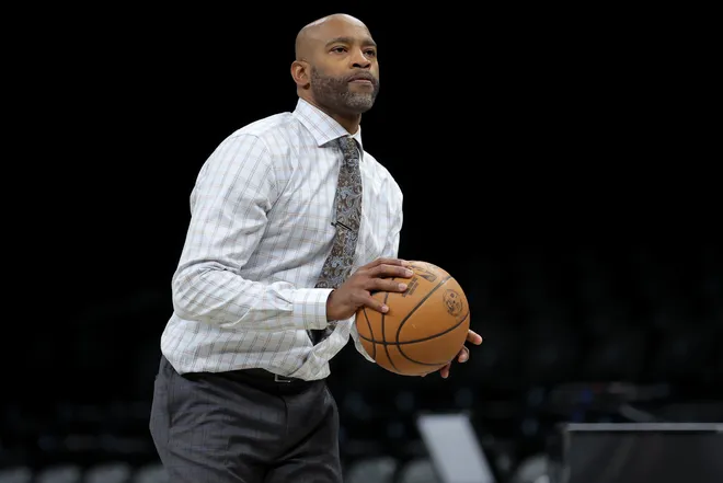 Mar 18, 2026; Brooklyn, New York, USA; Brooklyn Nets broadcaster and former player Vince Carter shoots baskets before a game against the Oklahoma City Thunder at Barclays Center. Mandatory Credit: Brad Penner-Imagn Images