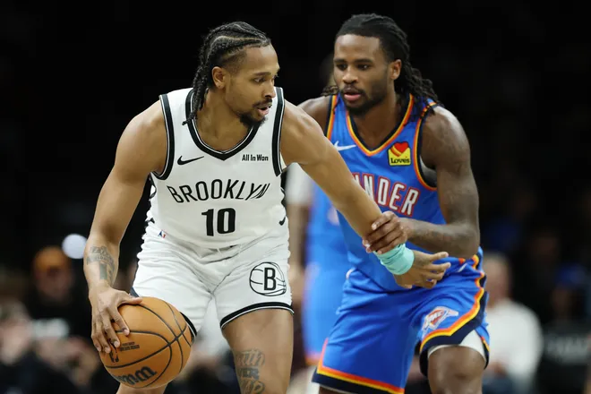 NEW YORK, NEW YORK - MARCH 18: Tyson Etienne #10 of the Brooklyn Nets dribbles against Cason Wallace #22 of the Oklahoma City Thunder during the first half at Barclays Center on March 18, 2026 in the Brooklyn borough of New York City. NOTE TO USER: User expressly acknowledges and agrees that, by downloading and or using this photograph, User is consenting to the terms and conditions of the Getty Images License Agreement. (Photo by Sarah Stier/Getty Images)