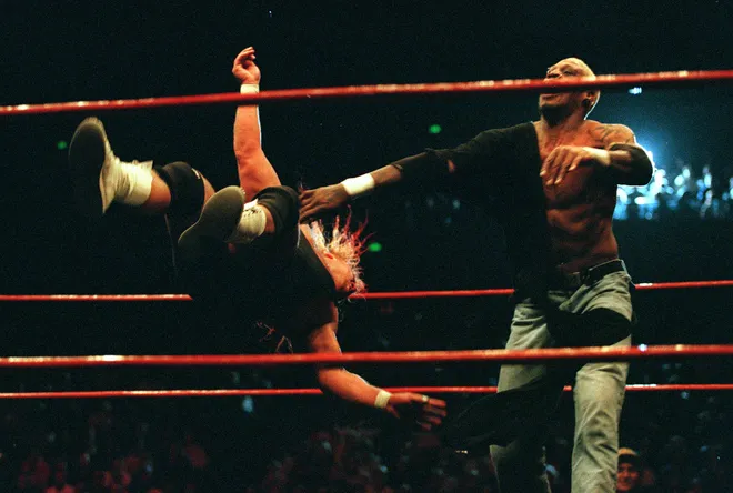Dennis Rodman throws ''Mr Perfect'' Curt Hennig.