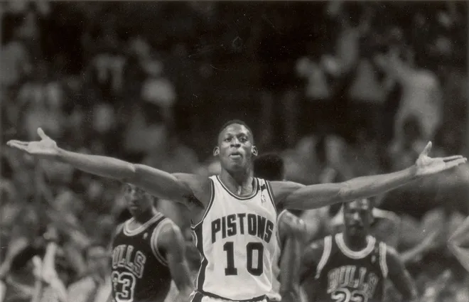 Dennis Rodman greets victory with open arms. He led the Pistons with 14 rebounds. NBA Eastern Conference Finals.