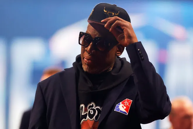 Dennis Rodman reacts after being introduced as part of the NBA 75th Anniversary Team during the 2022 NBA All-Star Game at Rocket Mortgage Fieldhouse.