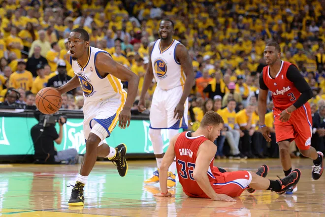 May 1, 2014; Oakland, CA, USA; Golden State Warriors guard Jordan Crawford (55) dribbles past Los Angeles Clippers forward Blake Griffin (32) during the second quarter in game six of the first round of the 2014 NBA Playoffs at Oracle Arena. Mandatory Credit: Kyle Terada-USA TODAY Sports