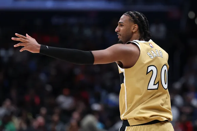 WASHINGTON, DC - MARCH 21: Alex Sarr #20 of the Washington Wizards celebrates after scoring a three-pointer against the Oklahoma City Thunder during the second half at Capital One Arena on March 21, 2026 in Washington, DC. NOTE TO USER: User expressly acknowledges and agrees that, by downloading and or using this photograph, User is consenting to the terms and conditions of the Getty Images License Agreement. (Photo by Patrick Smith/Getty Images)