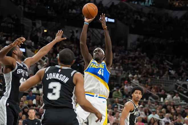 Mar 21, 2026; San Antonio, Texas, USA; Indiana Pacers forward Pascal Siakam (43) shoots over San Antonio Spurs forward Harrison Barnes (40) in the first half at Frost Bank Center. Mandatory Credit: Daniel Dunn-Imagn Images