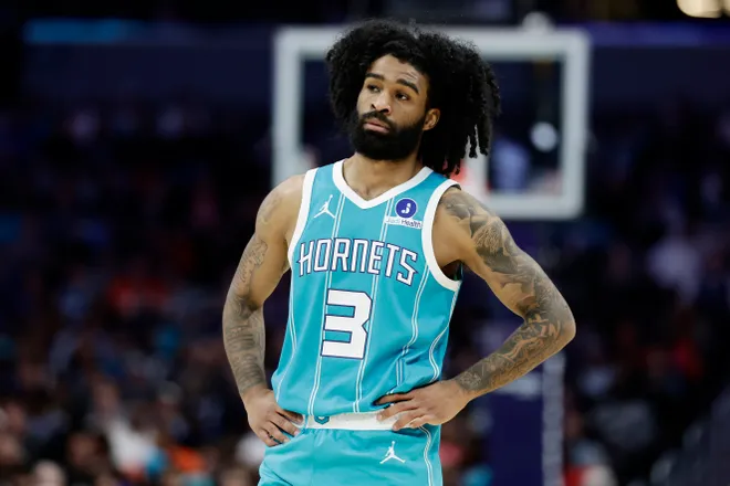 Mar 19, 2026; Charlotte, North Carolina, USA; Charlotte Hornets guard Coby White (3) stands on the court during the third quarter against the Orlando Magic at Spectrum Center. Mandatory Credit: Brian Westerholt-Imagn Images