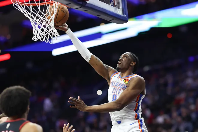 Mar 23, 2026; Philadelphia, Pennsylvania, USA; Oklahoma City Thunder guard Jalen Williams (8) scores against the Philadelphia 76ers during the third quarter at Xfinity Mobile Arena. Mandatory Credit: Bill Streicher-Imagn Images
