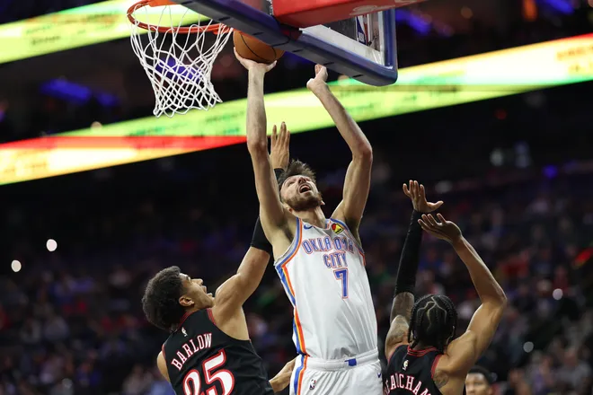Mar 23, 2026; Philadelphia, Pennsylvania, USA; Oklahoma City Thunder center Chet Holmgren (7) scores against the Philadelphia 76ers during the third quarter at Xfinity Mobile Arena. Mandatory Credit: Bill Streicher-Imagn Images