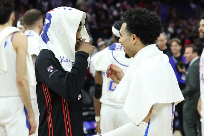 Mar 23, 2026; Philadelphia, Pennsylvania, USA; Philadelphia 76ers guard Vj Edgecombe (L) and Oklahoma City Thunder guard Jared McCain (R) talk after the game at Xfinity Mobile Arena. Mandatory Credit: Bill Streicher-Imagn Images