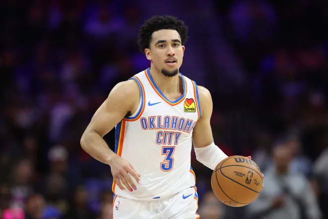 Mar 23, 2026; Philadelphia, Pennsylvania, USA; Oklahoma City Thunder guard Jared McCain (3) dribbles the ball against the Philadelphia 76ers during the fourth quarter at Xfinity Mobile Arena. Mandatory Credit: Bill Streicher-Imagn Images