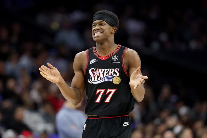 PHILADELPHIA, PENNSYLVANIA - MARCH 23: Vj Edgecombe #77 of the Philadelphia 76ers reacts during the first half against the Oklahoma City Thunder at Xfinity Mobile Arena on March 23, 2026 in Philadelphia, Pennsylvania. NOTE TO USER: User expressly acknowledges and agrees that, by downloading and or using this photograph, User is consenting to the terms and conditions of the Getty Images License Agreement. (Photo by Emilee Chinn/Getty Images)