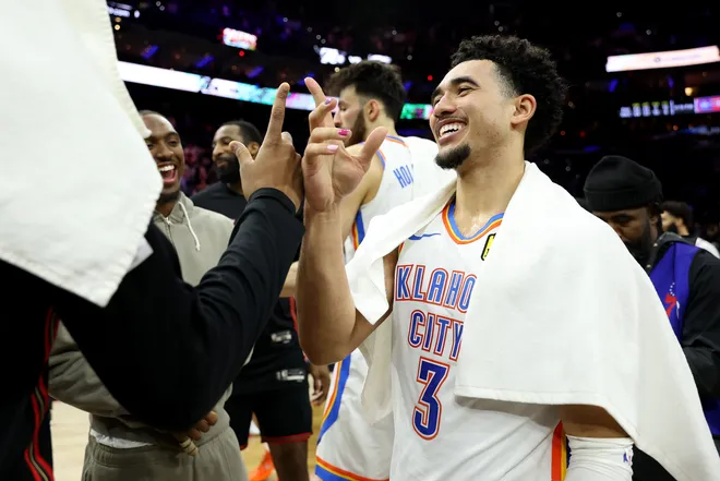 PHILADELPHIA, PENNSYLVANIA - MARCH 23: Jared McCain #3 of the Oklahoma City Thunder reunites with former Philadelphia 76ers teammates after a game at Xfinity Mobile Arena on March 23, 2026 in Philadelphia, Pennsylvania. NOTE TO USER: User expressly acknowledges and agrees that, by downloading and or using this photograph, User is consenting to the terms and conditions of the Getty Images License Agreement. (Photo by Emilee Chinn/Getty Images)