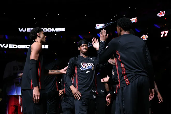 PHILADELPHIA, PENNSYLVANIA - MARCH 23: Vj Edgecombe #77 of the Philadelphia 76ers is introduced before a game against the Oklahoma City Thunder at Xfinity Mobile Arena on March 23, 2026 in Philadelphia, Pennsylvania. NOTE TO USER: User expressly acknowledges and agrees that, by downloading and or using this photograph, User is consenting to the terms and conditions of the Getty Images License Agreement. (Photo by Emilee Chinn/Getty Images)