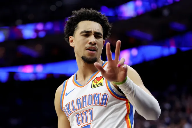 PHILADELPHIA, PENNSYLVANIA - MARCH 23: Jared McCain #3 of the Oklahoma City Thunder celebrates a three-pointer during the first half against the Philadelphia 76ers at Xfinity Mobile Arena on March 23, 2026 in Philadelphia, Pennsylvania. NOTE TO USER: User expressly acknowledges and agrees that, by downloading and or using this photograph, User is consenting to the terms and conditions of the Getty Images License Agreement. (Photo by Emilee Chinn/Getty Images)