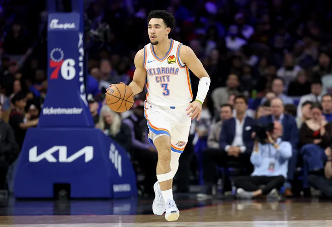 PHILADELPHIA, PENNSYLVANIA - MARCH 23: Jared McCain #3 of the Oklahoma City Thunder dribbles the ball during the first half against the Philadelphia 76ers at Xfinity Mobile Arena on March 23, 2026 in Philadelphia, Pennsylvania. NOTE TO USER: User expressly acknowledges and agrees that, by downloading and or using this photograph, User is consenting to the terms and conditions of the Getty Images License Agreement. (Photo by Emilee Chinn/Getty Images)