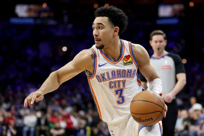 PHILADELPHIA, PENNSYLVANIA - MARCH 23: Jared McCain #3 of the Oklahoma City Thunder dribbles the ball during the first half against the Philadelphia 76ers at Xfinity Mobile Arena on March 23, 2026 in Philadelphia, Pennsylvania. NOTE TO USER: User expressly acknowledges and agrees that, by downloading and or using this photograph, User is consenting to the terms and conditions of the Getty Images License Agreement. (Photo by Emilee Chinn/Getty Images)