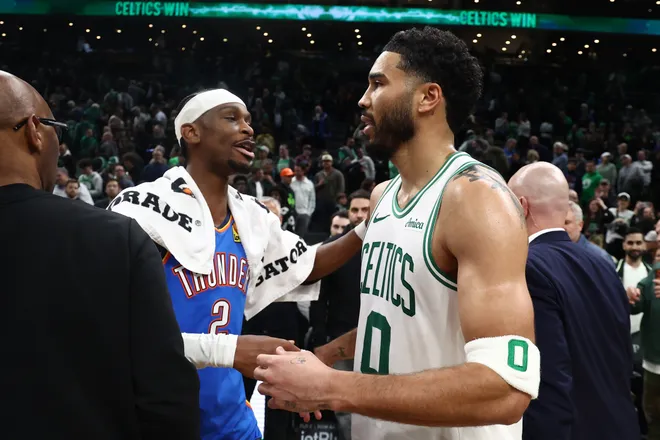 Mar 25, 2026; Boston, Massachusetts, USA; Oklahoma City Thunder guard Shai Gilgeous-Alexander (2) talks with Boston Celtics forward Jayson Tatum (0) after their game at TD Garden. Mandatory Credit: Winslow Townson-Imagn Images
