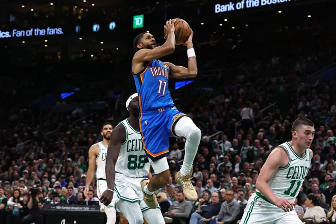 Mar 25, 2026; Boston, Massachusetts, USA; Oklahoma City Thunder guard Isaiah Joe (11) goes to the basket against the Boston Celtics during the second quarter at TD Garden. Mandatory Credit: Winslow Townson-Imagn Images