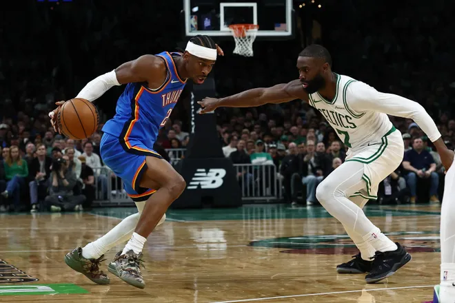 Mar 25, 2026; Boston, Massachusetts, USA; Oklahoma City Thunder guard Shai Gilgeous-Alexander (2) looks to drive on Boston Celtics guard Jaylen Brown (7) during the second quarter at TD Garden. Mandatory Credit: Winslow Townson-Imagn Images