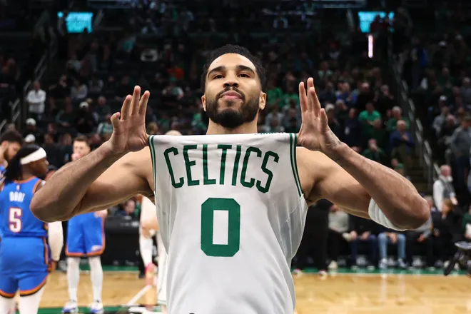 Mar 25, 2026; Boston, Massachusetts, USA; Boston Celtics forward Jayson Tatum (0) shows off his jersey before their game against the Oklahoma City Thunder at TD Garden. Mandatory Credit: Winslow Townson-Imagn Images