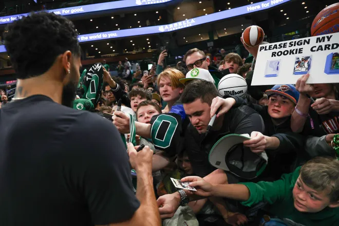 Mar 25, 2026; Boston, Massachusetts, USA; Fans jostle to get an autograph from Boston Celtics forward Jayson Tatum (0) before their game against the Oklahoma City Thunder at TD Garden. Mandatory Credit: Winslow Townson-Imagn Images