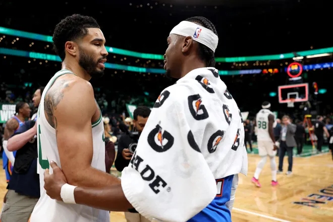 BOSTON, MASSACHUSETTS - MARCH 25: Jaylen Brown #7 of the Boston Celtics talks with Shai Gilgeous-Alexander #2 of the Oklahoma City Thunder after the Celtics defeat the Thunder 119-109 at TD Garden on March 25, 2026 in Boston, Massachusetts. NOTE TO USER: User expressly acknowledges and agrees that, by downloading and/or using this Photograph, user is consenting to the terms and conditions of the Getty Images License Agreement. (Photo by Maddie Meyer/Getty Images)