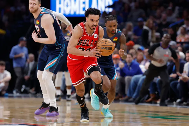 Mar 27, 2026; Oklahoma City, Oklahoma, USA; Chicago Bulls guard Tre Jones (30) drives down the court after stealing the ball away from Oklahoma City Thunder guard Cason Wallace (22) during the second half at Paycom Center. Mandatory Credit: Alonzo Adams-Imagn Images