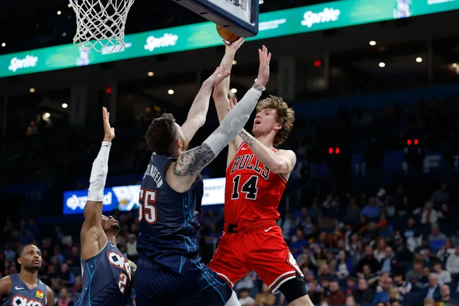 Mar 27, 2026; Oklahoma City, Oklahoma, USA; Chicago Bulls forward Matas Buzelis (14) shoots as Oklahoma City Thunder center Isaiah Hartenstein (55) defends during the second half at Paycom Center. Mandatory Credit: Alonzo Adams-Imagn Images