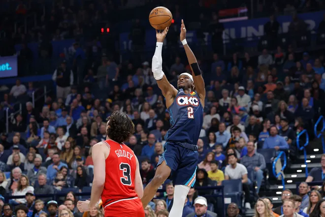 Mar 27, 2026; Oklahoma City, Oklahoma, USA; Oklahoma City Thunder guard Shai Gilgeous-Alexander (2) shoots over Chicago Bulls guard Josh Giddey (3) during the first quarter at Paycom Center. Mandatory Credit: Alonzo Adams-Imagn Images