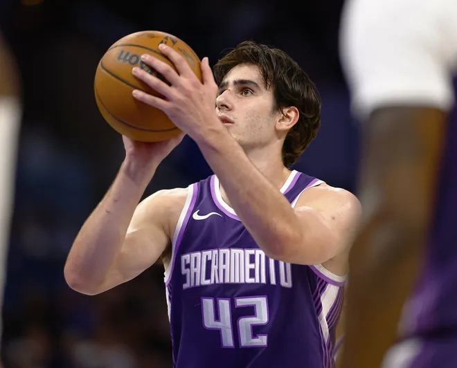 Mar 26, 2026; Orlando, Florida, USA; Sacramento Kings center Maxime Raynaud (42) shoots a free throw in the first half against the Orlando Magic at Kia Center.