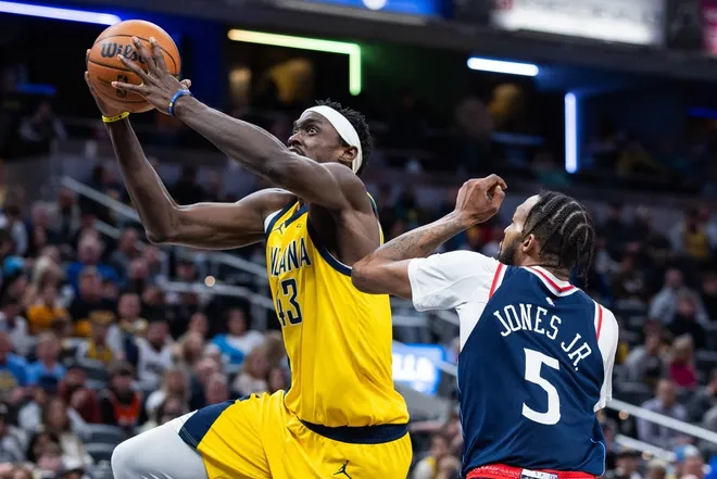 Mar 27, 2026; Indianapolis, Indiana, USA; Indiana Pacers forward Pascal Siakam (43) shoots against LA Clippers forward Derrick Jones Jr. (5) in the second half at Gainbridge Fieldhouse.