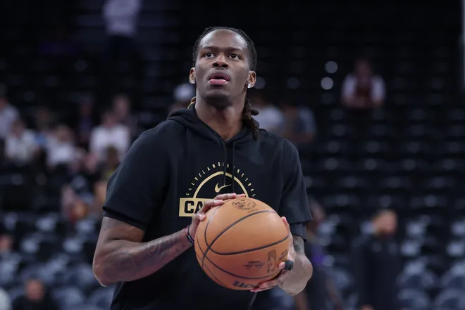 Mar 30, 2026; Salt Lake City, Utah, USA; Cleveland Cavaliers guard Keon Ellis (14) warms up before the game against the Utah Jazz at Delta Center. Mandatory Credit: Rob Gray-Imagn Images