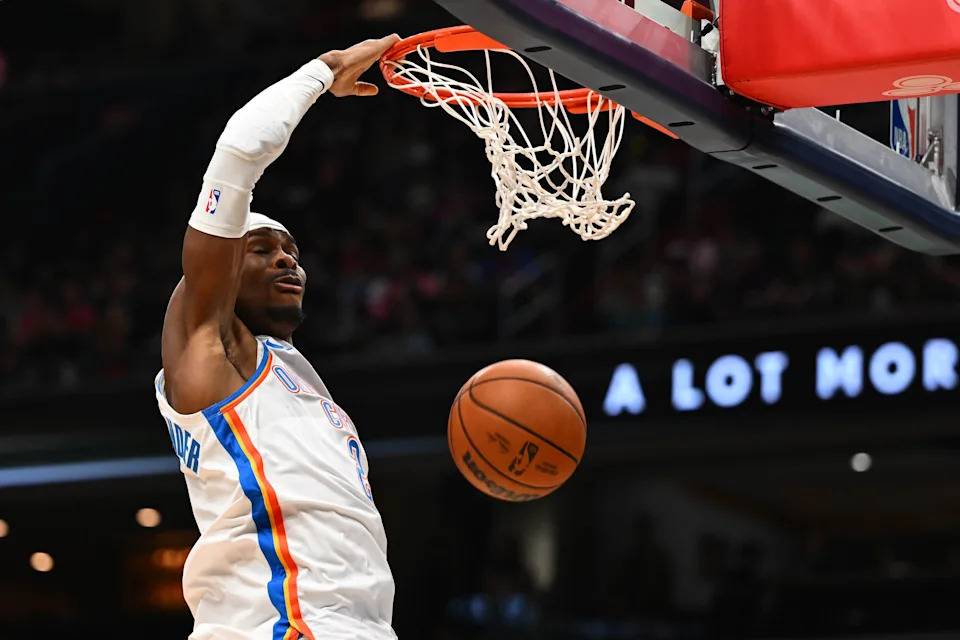 Mar 21, 2026; Washington, District of Columbia, USA; Oklahoma City Thunder guard Shai Gilgeous-Alexander (2) dunks against the Washington Wizards during the second half at Capital One Arena. Mandatory Credit: Brad Mills-Imagn Images