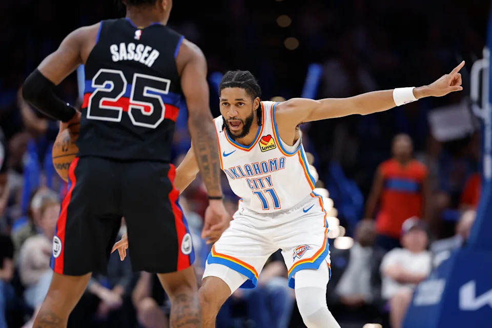 Mar 30, 2026; Oklahoma City, Oklahoma, USA; Oklahoma City Thunder guard Isaiah Joe (11) gestures as he defends Detroit Pistons guard Marcus Sasser (25) during the second half at Paycom Center. Mandatory Credit: Alonzo Adams-Imagn Images