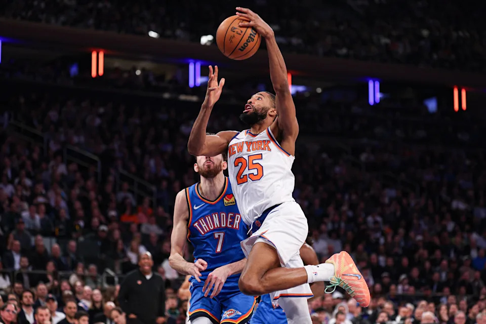 Mar 4, 2026; New York, New York, USA; New York Knicks guard Mikal Bridges (25) goes to the basket against Oklahoma City Thunder center Chet Holmgren (7) during the second half at Madison Square Garden. Mandatory Credit: Vincent Carchietta-Imagn Images