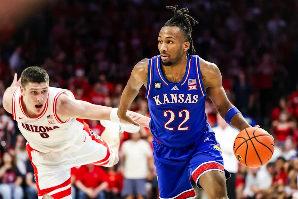 Feb 28, 2026; Tucson, Arizona, USA; Kansas Jayhawks guard Darryn Peterson (22) dribbles the ball during the first half of the game against the Arizona Wildcats at McKale Memorial Center. Mandatory Credit: Aryanna Frank-Imagn Images