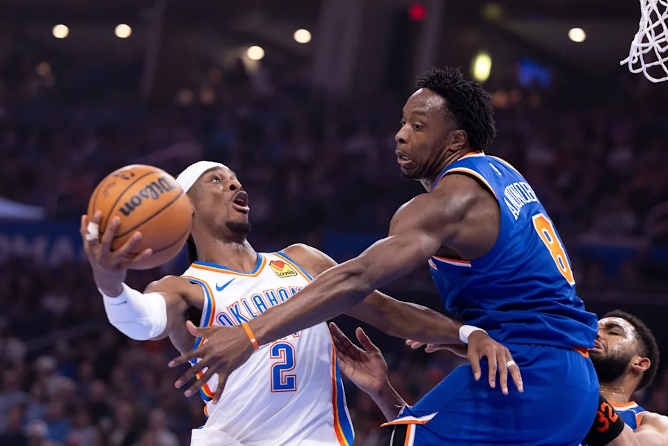 OKLAHOMA CITY, OKLAHOMA - MARCH 29: Shai Gilgeous-Alexander #2 of the Oklahoma City Thunder shoots the ball around Og Anunoby #8 of the New York Knicks during the first half at Paycom Center on March 29, 2026 in Oklahoma City, Oklahoma. NOTE TO USER: User expressly acknowledges and agrees that, by downloading and or using this photograph, User is consenting to the terms and conditions of the Getty Images License Agreement. (Photo by William Purnell/Getty Images)
