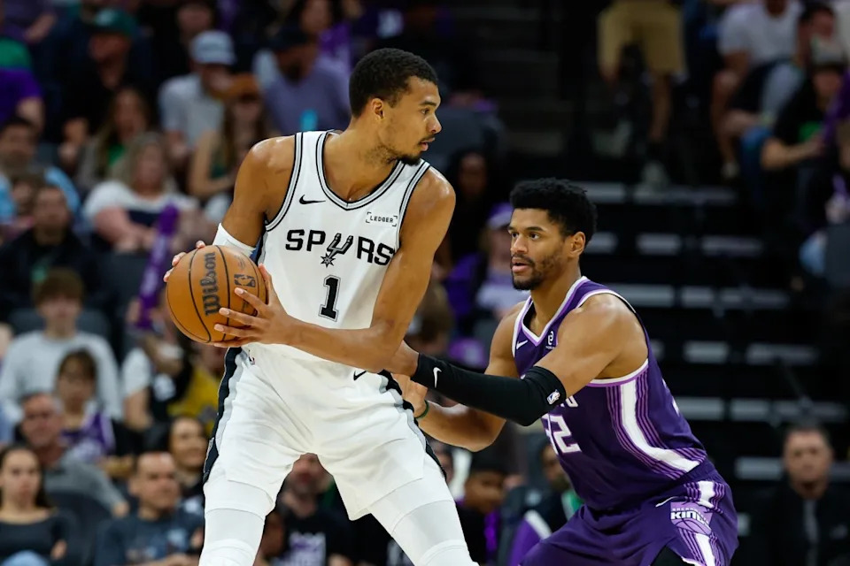 San Antonio Spurs center Victor Wembanyama controls the ball as Sacramento Kings.Sergio Estrada-Imagn Images