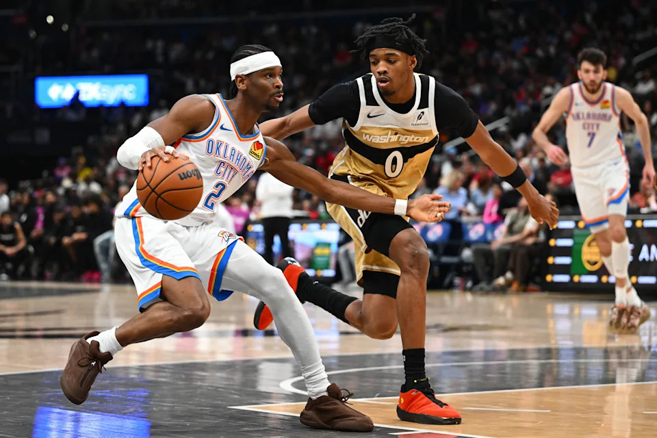 Mar 21, 2026; Washington, District of Columbia, USA; Oklahoma City Thunder guard Shai Gilgeous-Alexander (2) drives as Washington Wizards guard Bilal Coulibaly (0) defends during the second half at Capital One Arena. Mandatory Credit: Brad Mills-Imagn Images