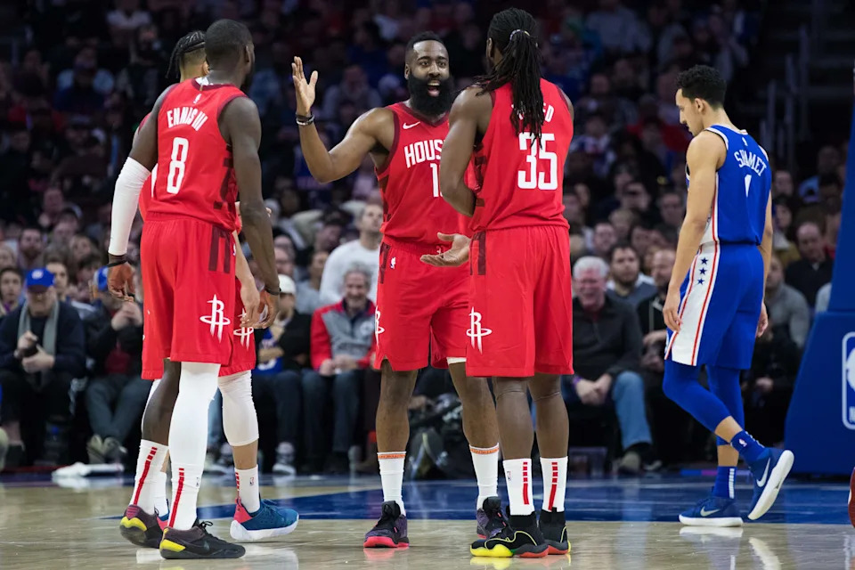 Jan 21, 2019; Philadelphia, PA, USA; Houston Rockets guard James Harden (13) talks with Kenneth Faried (35) and forward James Ennis III (8) during the first quarter against the Philadelphia 76ers at Wells Fargo Center. Mandatory Credit: Bill Streicher-USA TODAY Sports