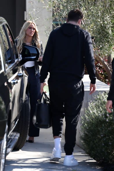 Doncic is seen with his business manager Lara Beth Seager