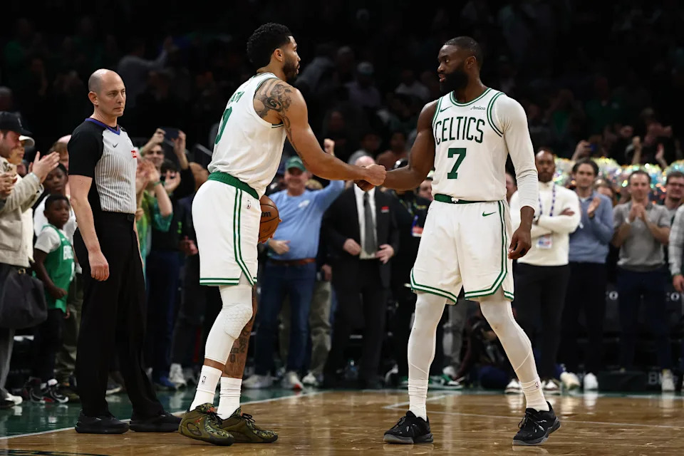 Mar 25, 2026; Boston, Massachusetts, USA; Boston Celtics guard Jaylen Brown (7) and forward Jayson Tatum (0) congratulate each other in the final seconds of the fourth quarter of their win over the Oklahoma City Thunder at TD Garden. Mandatory Credit: Winslow Townson-Imagn Images